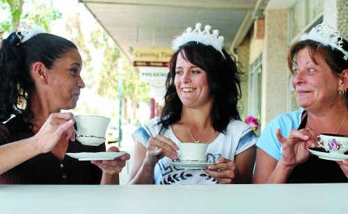 Customer Bree Field (centre) shares a cuppa with Belle Vue cafe employers Joanna Budd and Melody Marsh on the day of the royal wedding. Customer Bree Field (centre) shares a cuppa with Belle Vue cafe employers Joanna Budd and Melody Marsh on the day of the royal wedding.